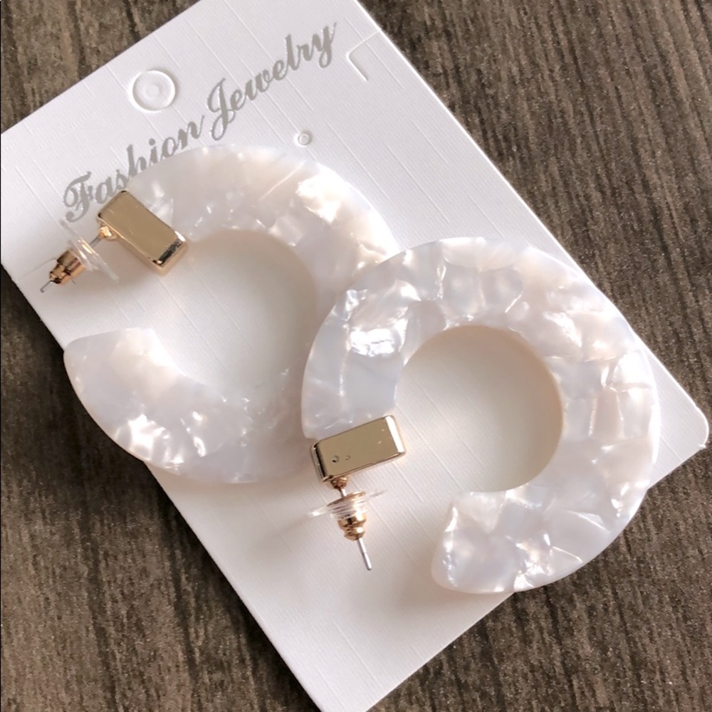 White hoop earrings